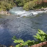Cabanas A Orillas De Rio